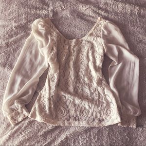 Lace and sheer sleeved longboard sleeve top cream